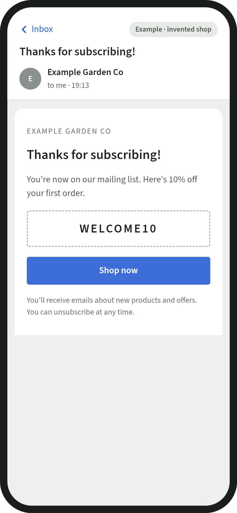 Mock-up of an invented shop's welcome email before setup: a plain grey message reading Thanks for subscribing, offering 10% off with a coupon code and a blue Shop now button.